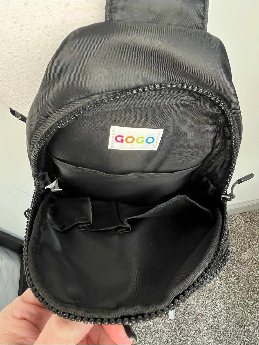Gogo black nylon convertible strap mini crossbody sling bag.